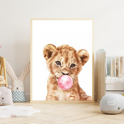 This charming watercolor illustration features a curious lion cub caught in a delightful moment, bl… for nursery