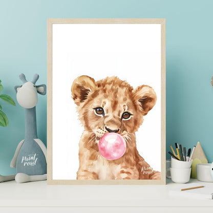 This charming watercolor illustration features a curious lion cub caught in a delightful moment, bl… for nursery