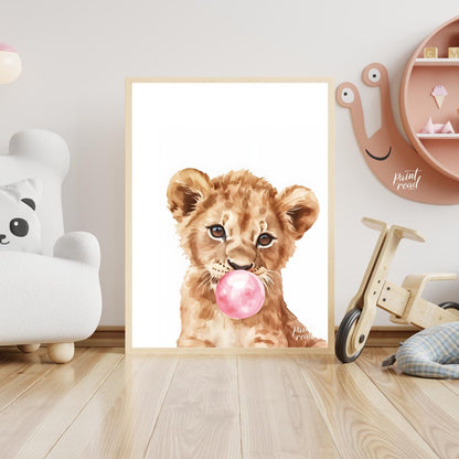 This charming watercolor illustration features a curious lion cub caught in a delightful moment, bl… for nursery