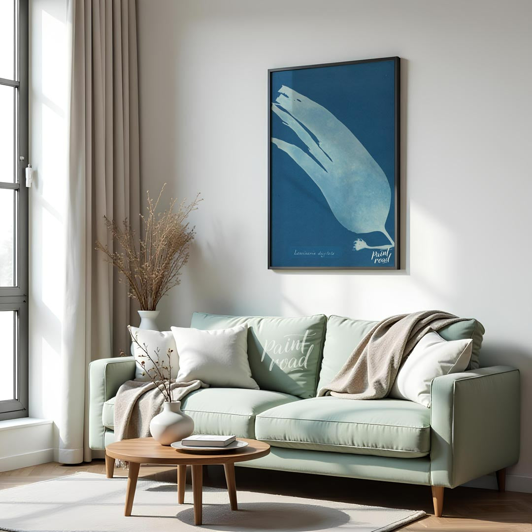 This mesmerizing art print showcases a classic cyanotype, presenting the ethereal silhouette of “La… for living room
