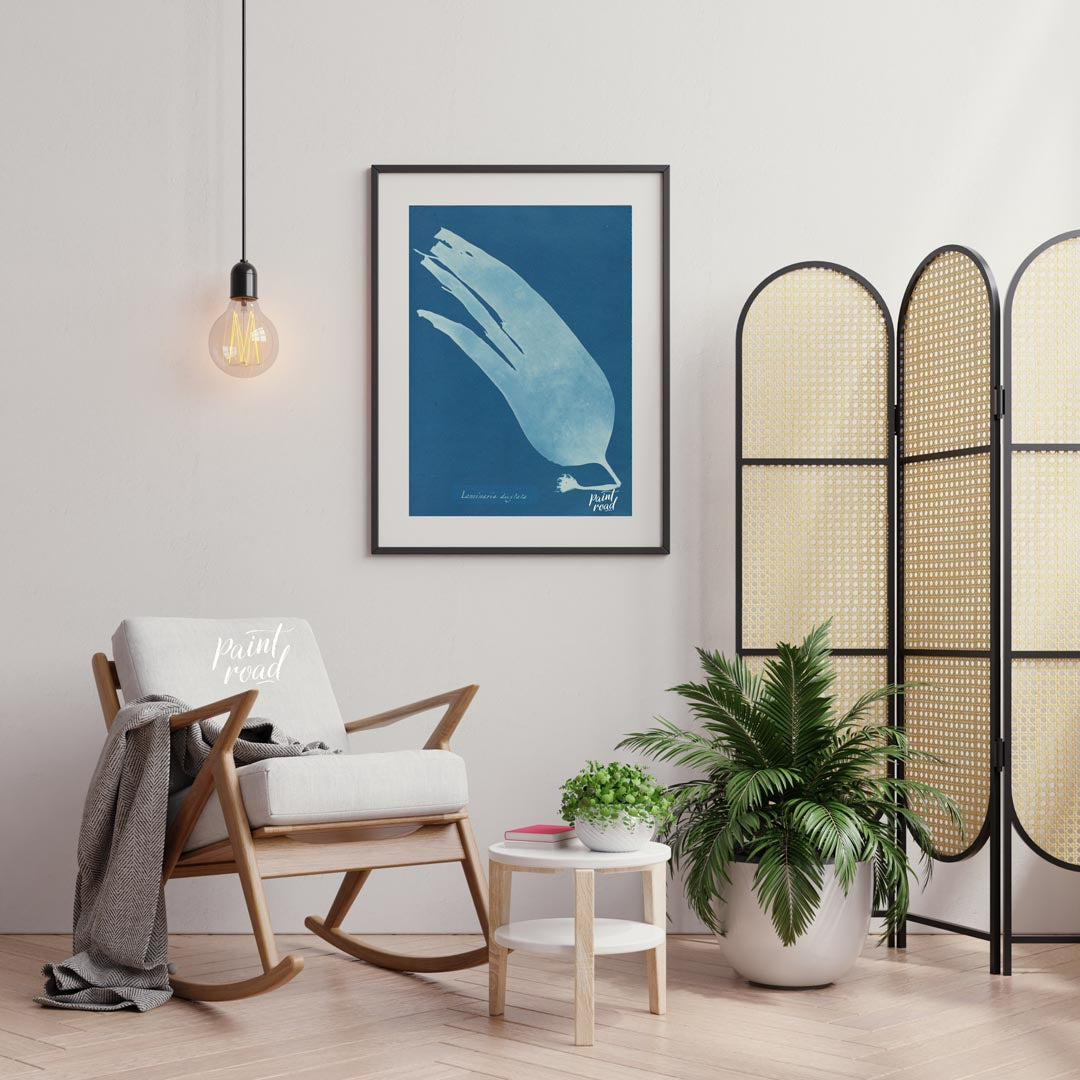 This mesmerizing art print showcases a classic cyanotype, presenting the ethereal silhouette of “La… for living room