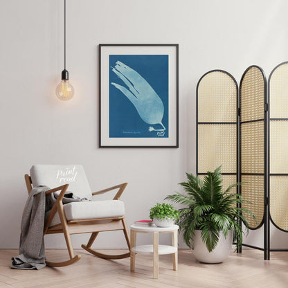 This mesmerizing art print showcases a classic cyanotype, presenting the ethereal silhouette of “La… for living room