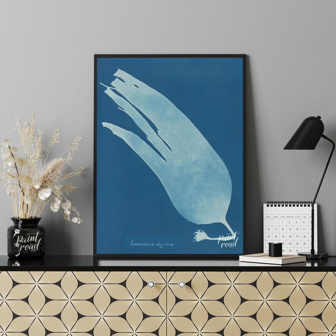 This mesmerizing art print showcases a classic cyanotype, presenting the ethereal silhouette of “La… for office