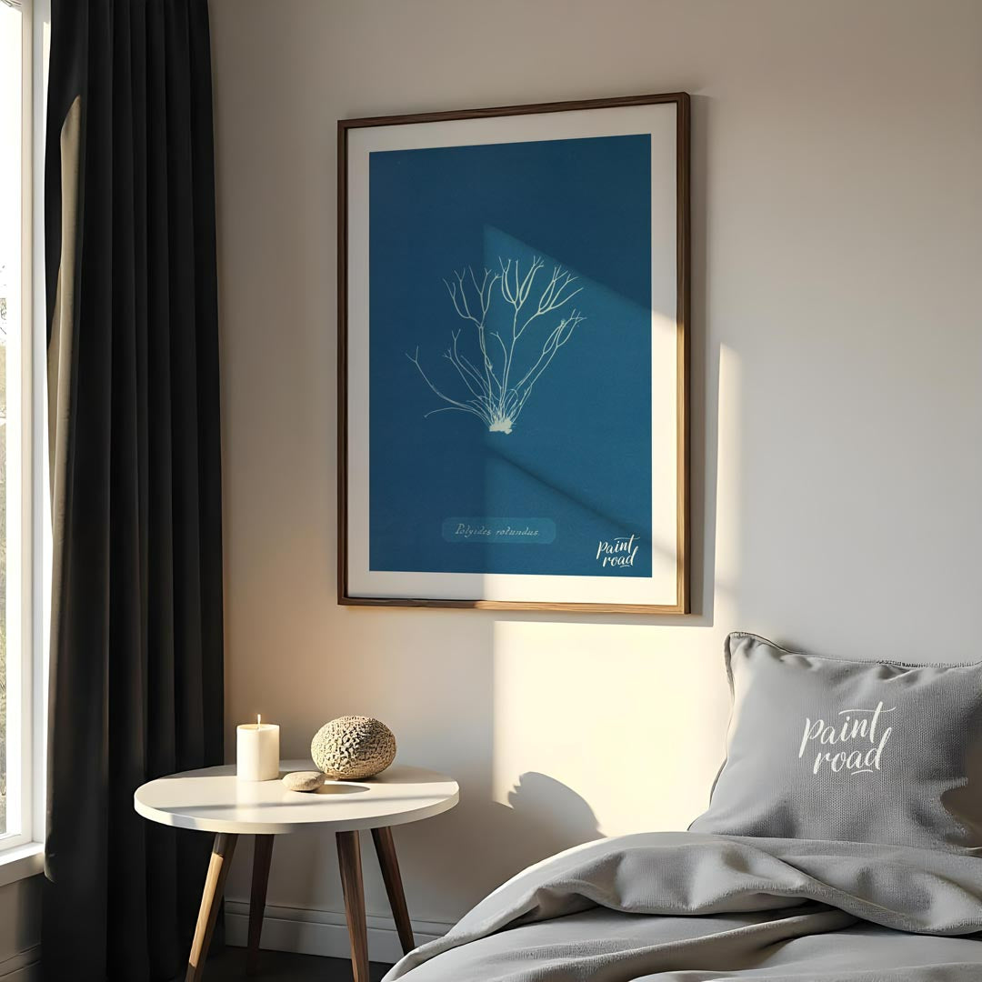 This exquisite art print is a classic cyanotype, capturing the delicate and intricate form of “Poly… for bedroom
