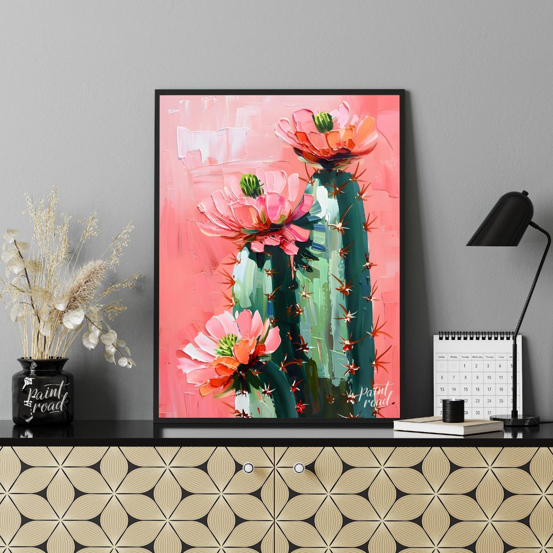 This vibrant painting captures the delicate beauty of cactus flowers against a soft, pink backdrop.… for office
