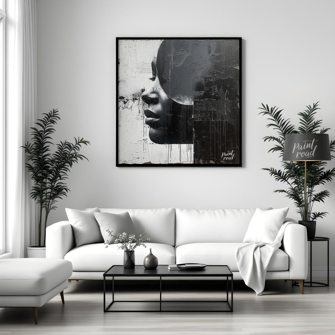 This striking painting features a woman's profile rendered in stark black and white, divided by a b… for abode