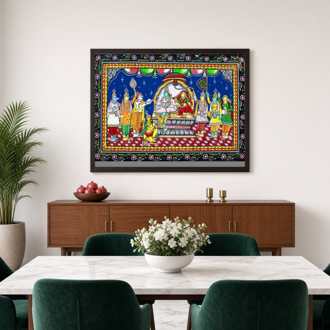 This exquisite Pattachitra painting captures the divine assembly of Lord Rama, elegantly seated for Dining