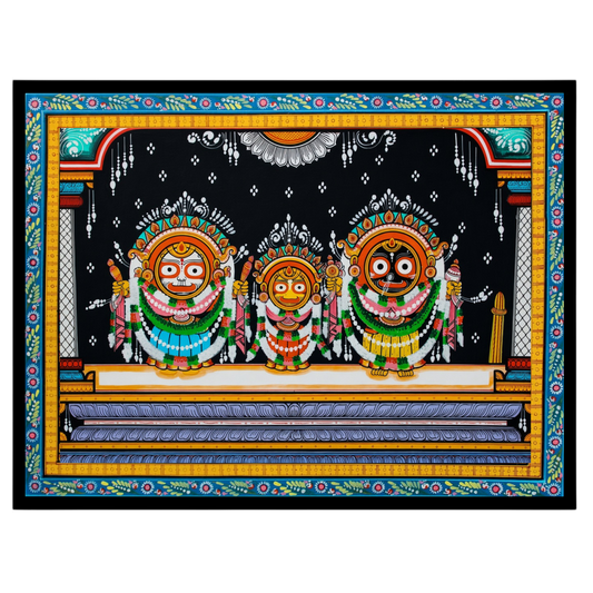 Experience the divine presence with this captivating Pattachitra artwork depicting the Jagannath for home
