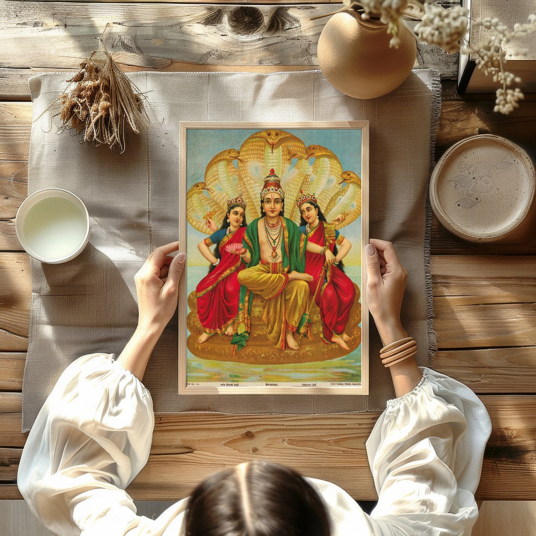 This captivating artwork depicts Lord Vishnu seated majestically, flanked by his consorts Lakshmi for Kitchen