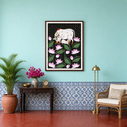 This exquisite Pichwai artwork captures the divine essence of Kamdhenu and her calf, surrounded by for Entrance