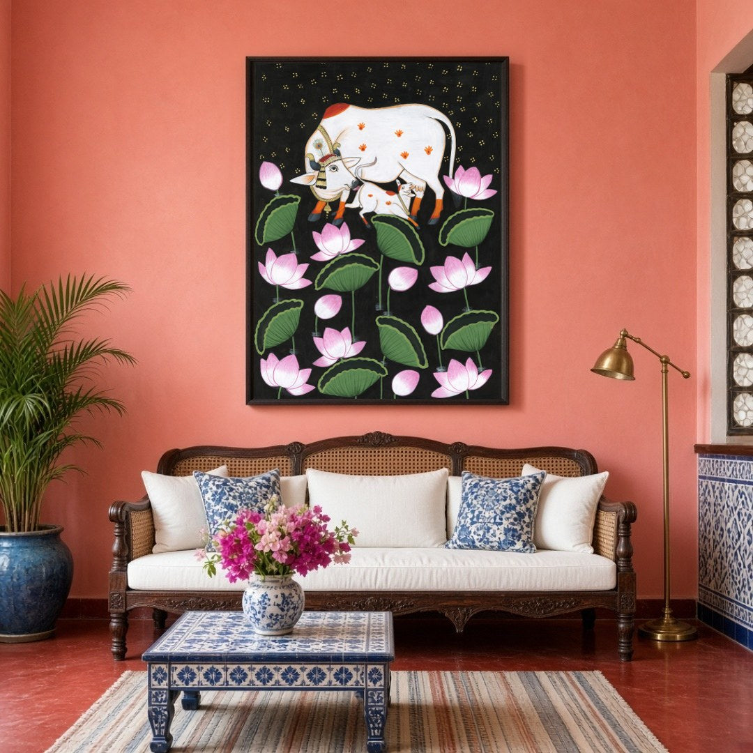 This exquisite Pichwai artwork captures the divine essence of Kamdhenu and her calf, surrounded by for Living Room
