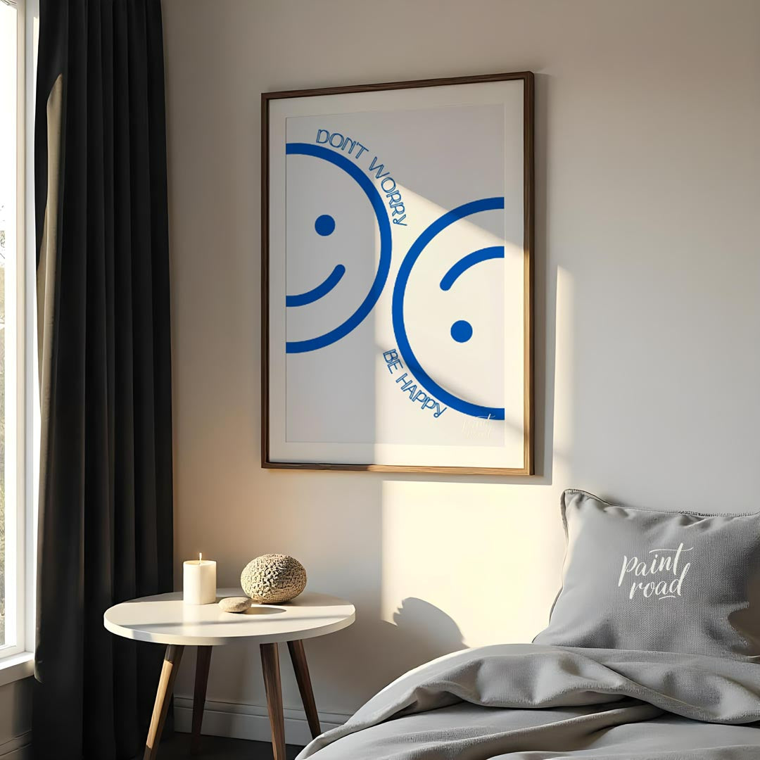This cheerful and minimalist artwork features two large, abstract smiley faces rendered in a bright… for bedroom