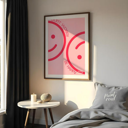 This cheerful and minimalist artwork features two large, abstract smiley faces rendered in a bright… for bedroom