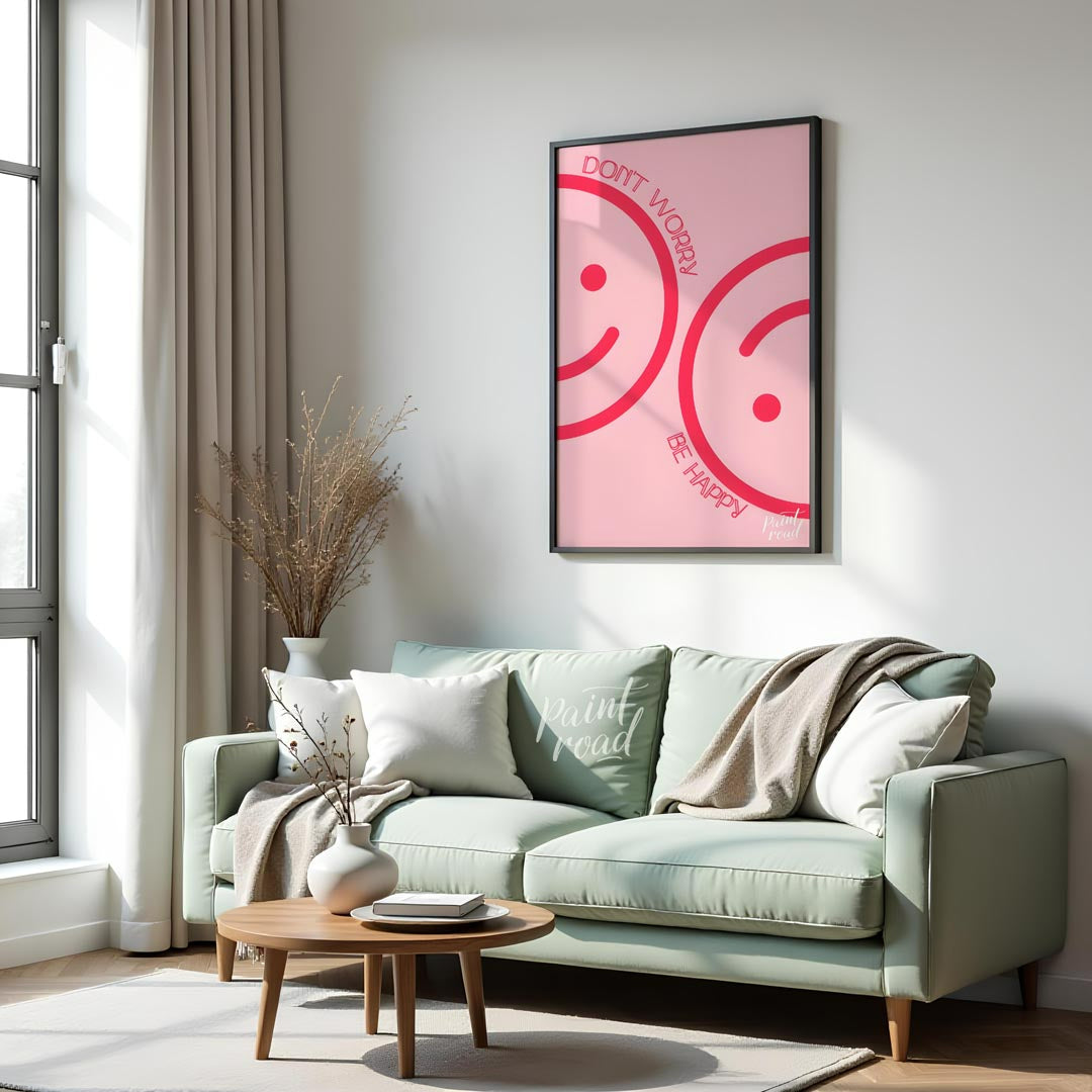 This cheerful and minimalist artwork features two large, abstract smiley faces rendered in a bright… for living room
