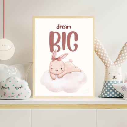 This enchanting watercolor illustration features an adorable, light pink bunny with long, soft ears… for nursery