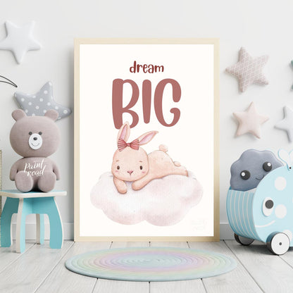 This enchanting watercolor illustration features an adorable, light pink bunny with long, soft ears… for nursery