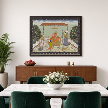 Celebrate the majestic aura of Lord Ganesha in this exquisite Pichwai art piece. Rendered with for Dining