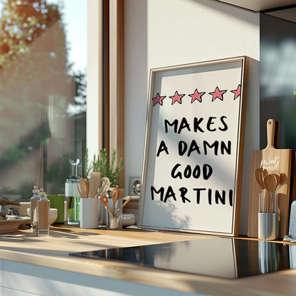 A fun and playful graphic design featuring the phrase "Makes a Damn Good Martini" written in a bold… for kitchen