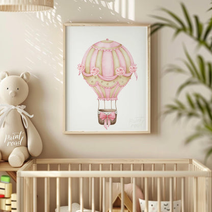 This elegant watercolor artwork features a beautifully decorated hot air balloon adorned with alter… for nursery