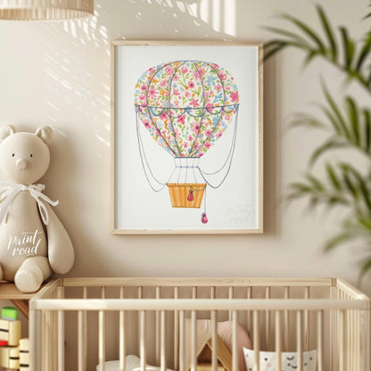 This vibrant watercolor illustration depicts a whimsical hot air balloon wrapped in a bouquet of ri… for nursery