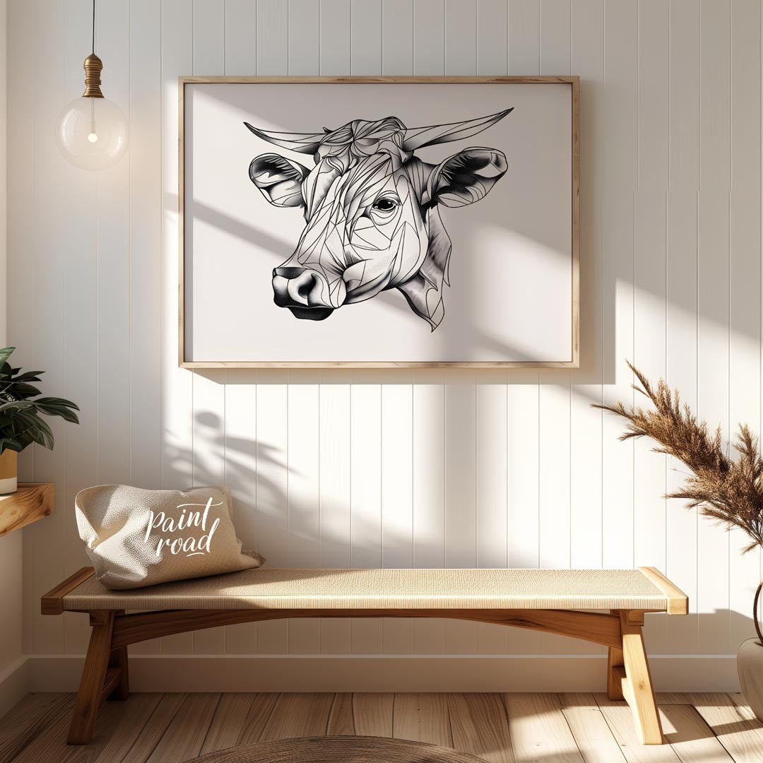 This striking black and white illustration features the head of a cow rendered in a unique geometri… for entryway