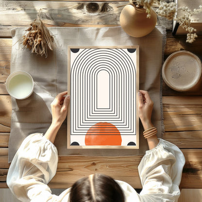 This captivating piece of modern wall art features a series of concentric arcs, drawing the eye for Kitchen