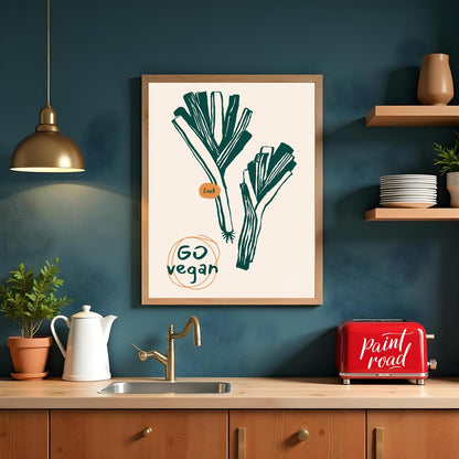 This poster features a clean and striking line art illustration of two leeks, depicted in a deep gr… for kitchen