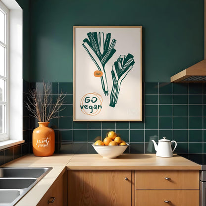 This poster features a clean and striking line art illustration of two leeks, depicted in a deep gr… for kitchen