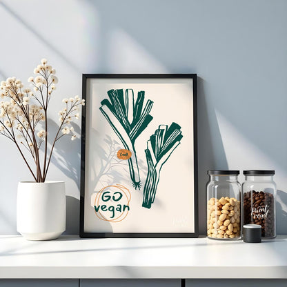 This poster features a clean and striking line art illustration of two leeks, depicted in a deep gr… for kitchen