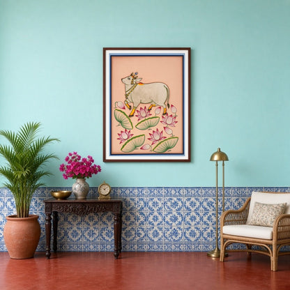 Immerse yourself in the tranquil beauty of this Pichwai artwork featuring a majestic Kamdhenu cow for Entrance