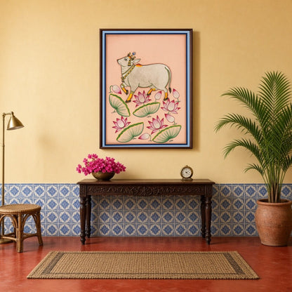 Immerse yourself in the tranquil beauty of this Pichwai artwork featuring a majestic Kamdhenu cow for Hallway