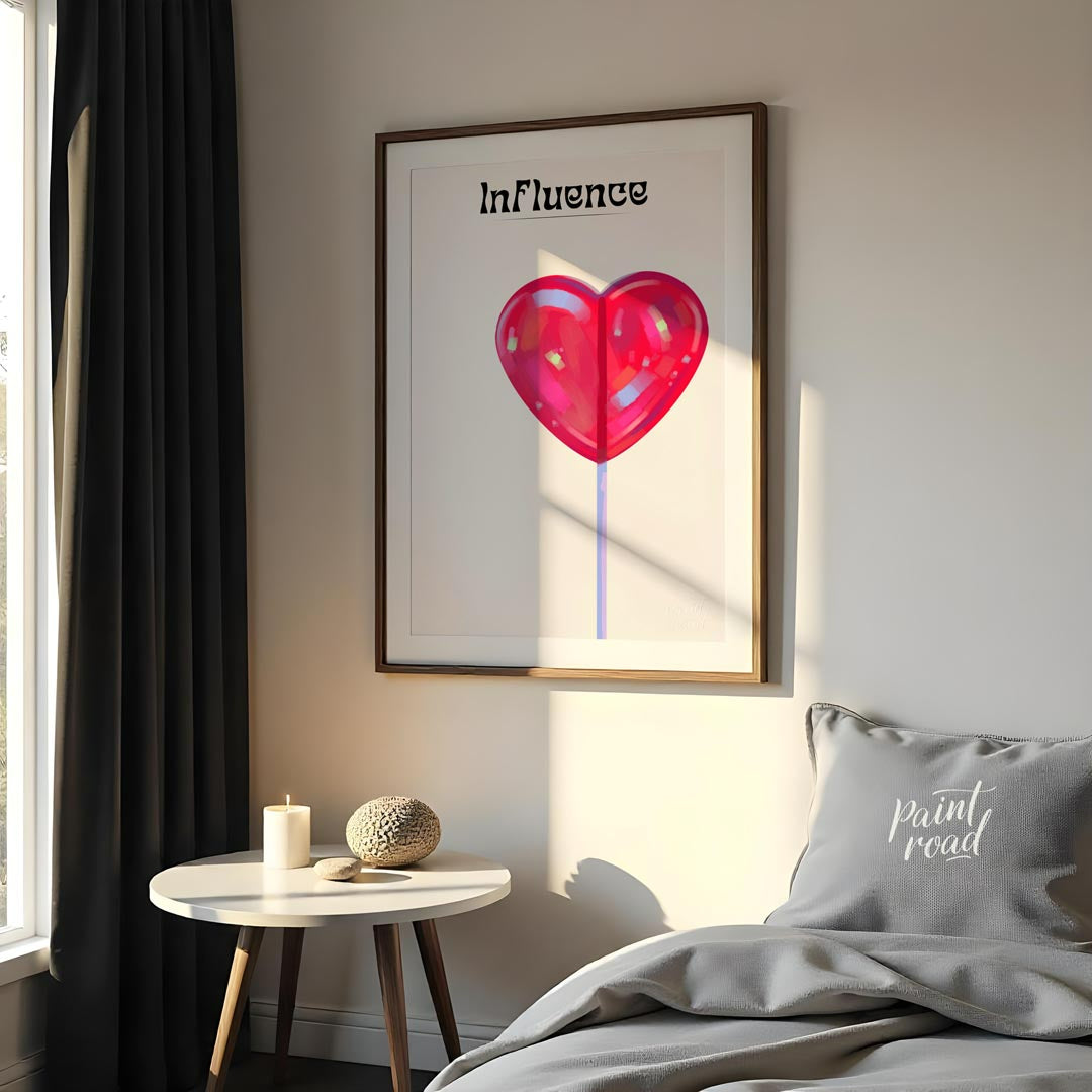 This whimsical and subtly intriguing artwork features a glossy, vibrant red heart-shaped lollipop a… for bathroom