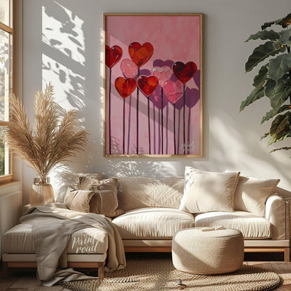This whimsical artwork features a collection of heart-shaped lollipops against a soft pink backdrop… for living room
