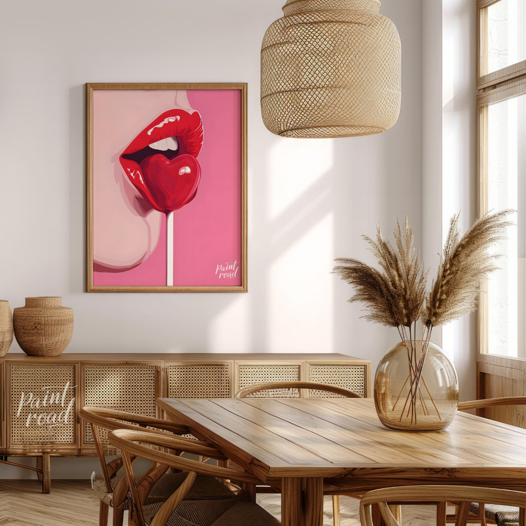 This striking image features a close-up of lips painted in a vibrant red, holding a heart-shaped lo… for dining room