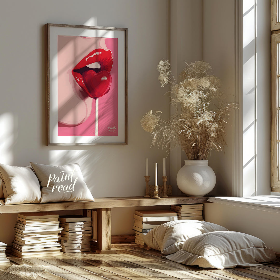 This striking image features a close-up of lips painted in a vibrant red, holding a heart-shaped lo… for living room