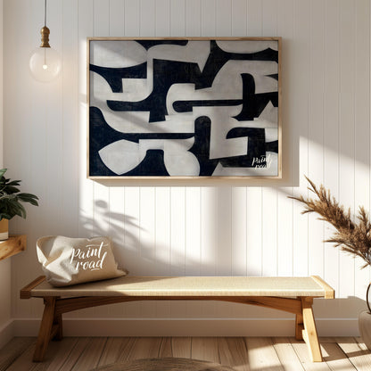 """Interlocking Forms"" presents a striking composition of abstract shapes in stark black and white… for entryway