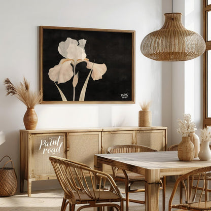 This elegant digital artwork, "Irina's Noir Iris" by Irina Fleming, features a single, luminous whi… for dining room