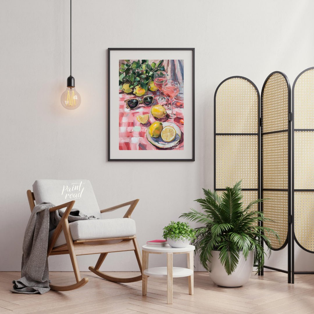 This charming painting captures a sun-drenched picnic scene, featuring ripe lemons, rosé wine glass… for living room