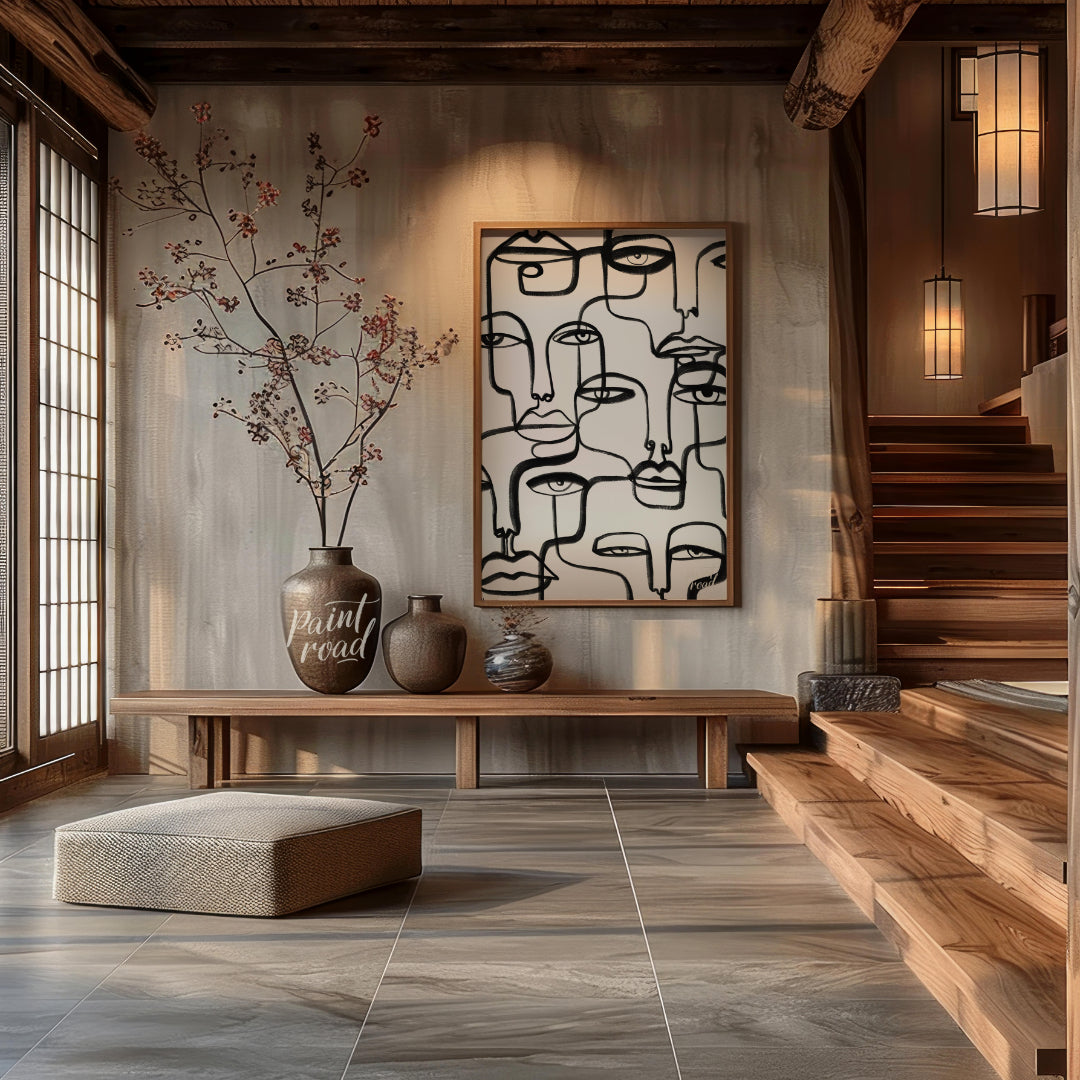 """Lineage of Faces"" presents a captivating array of stylized visages rendered in bold, continuous… for entryway
