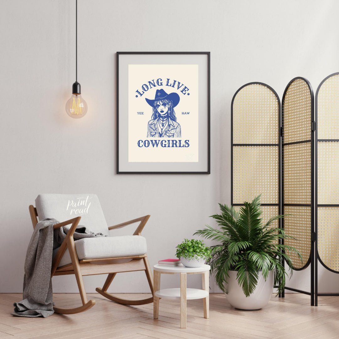This bold and striking graphic features a stylized portrait of a cowgirl, rendered in a strong blue… for living room