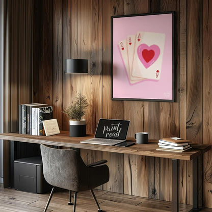 This charming and subtly romantic print features a hand of playing cards against a soft pink backgr… for office