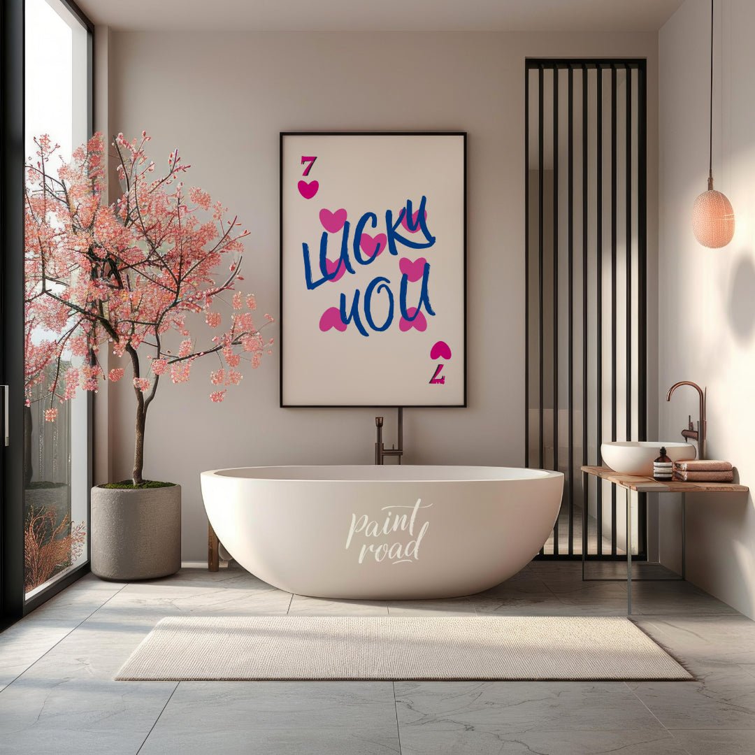 This playful and visually striking graphic features the phrase “LUCKY YOU” in bold, brushstroke-sty… for bathroom