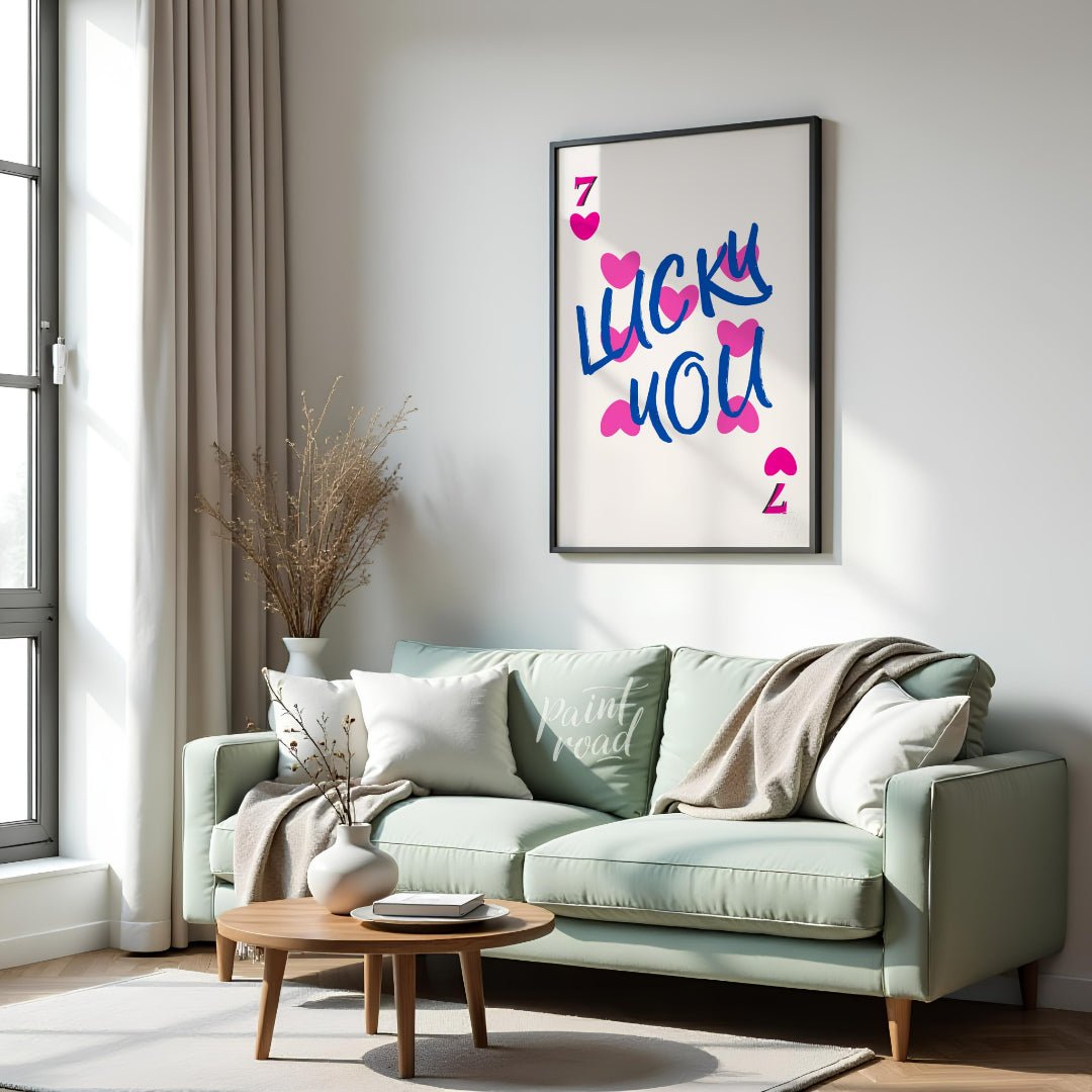 This playful and visually striking graphic features the phrase “LUCKY YOU” in bold, brushstroke-sty… for living room