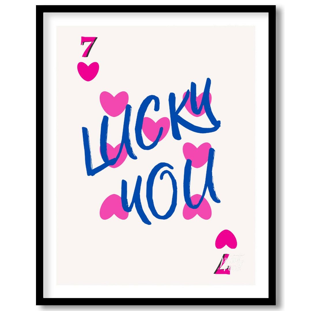 This playful and visually striking graphic features the phrase “LUCKY YOU” in bold, brushstroke-sty… for room