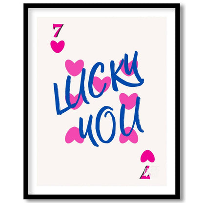 This playful and visually striking graphic features the phrase “LUCKY YOU” in bold, brushstroke-sty… for room