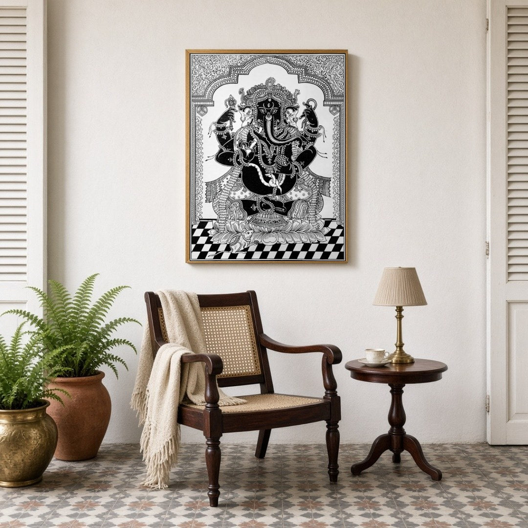 This exquisite Pattachitra artwork captures the revered Lord Ganesha in a striking black and white for Sitting Lounge