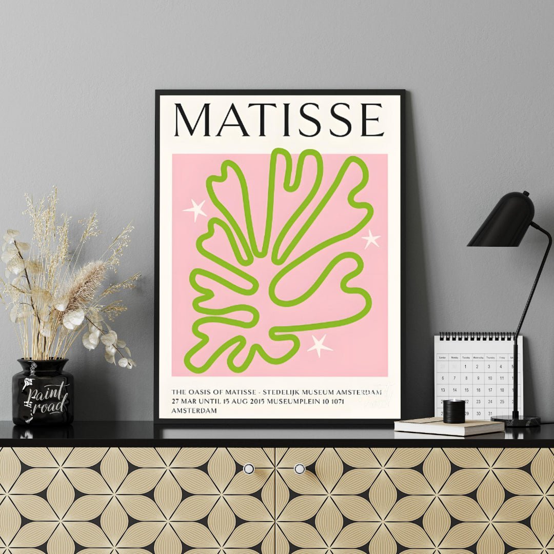 This poster showcases a captivating Matisse-inspired cut-out design, featuring a vibrant green, org… for office
