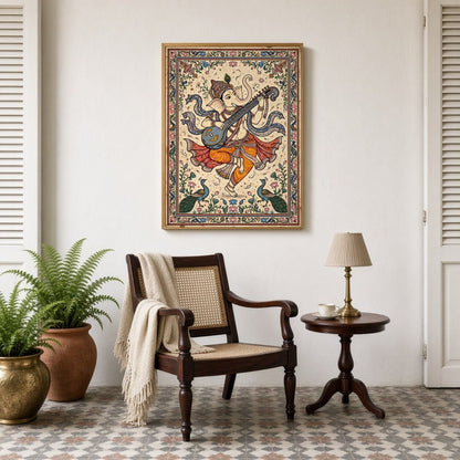 This exquisite artwork captures Lord Ganesha in a divine moment of musical harmony, playing a veena for Sitting Lounge