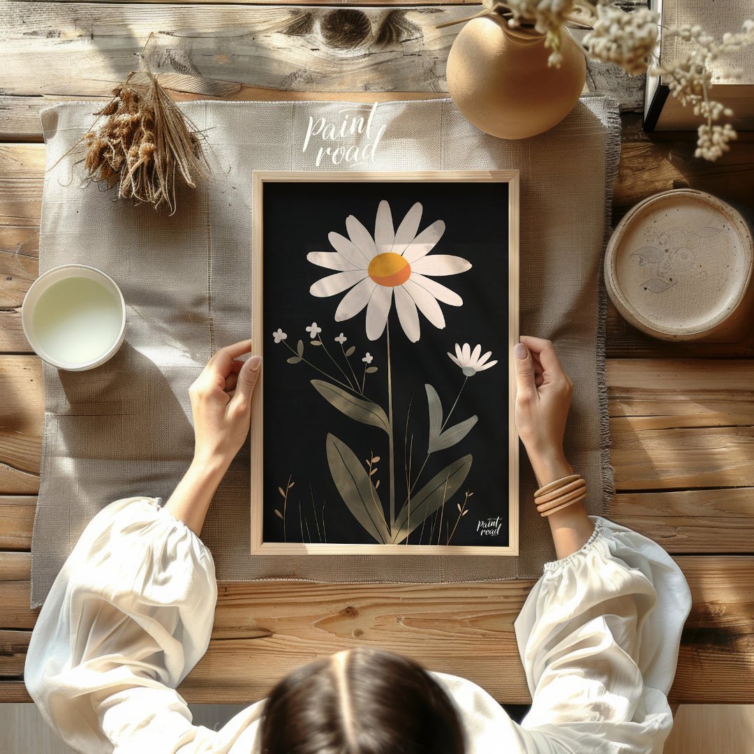 This striking digital illustration features a large white daisy with a warm yellow and orange cente… for dining room