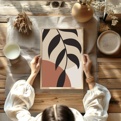Elevate your space with this striking minimalist botanical artwork. The elegant black leaves for Kitchen
